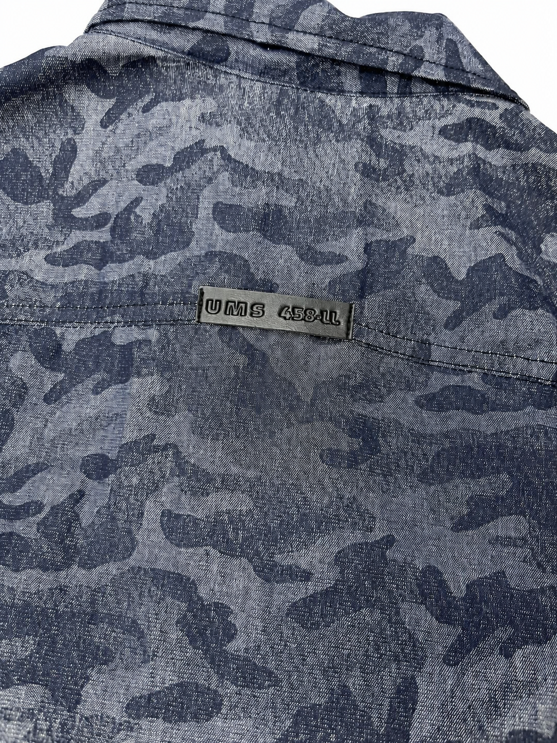 NAVY CAMO TRUCKER JACKET