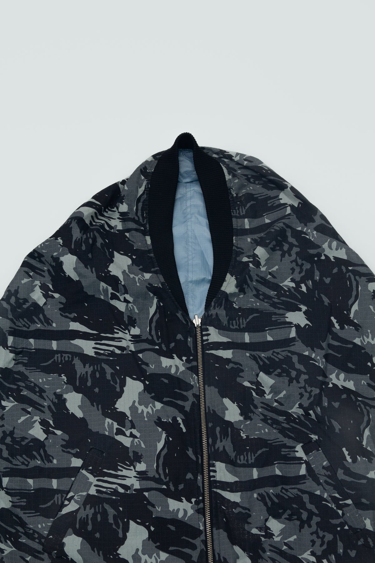 REVERSIBLE BOMBER JACKET BLUE/CAMO